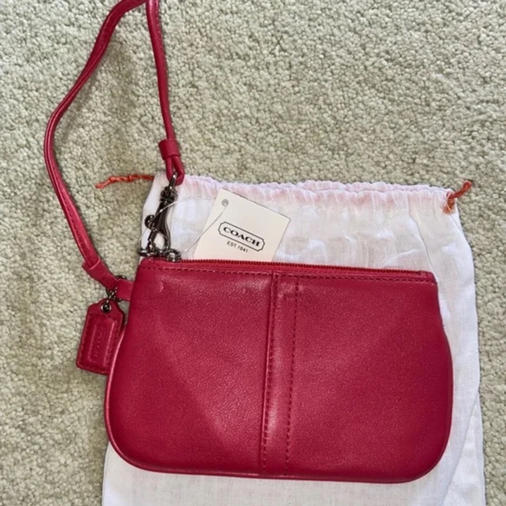 Coach Peach Leather Wristlet